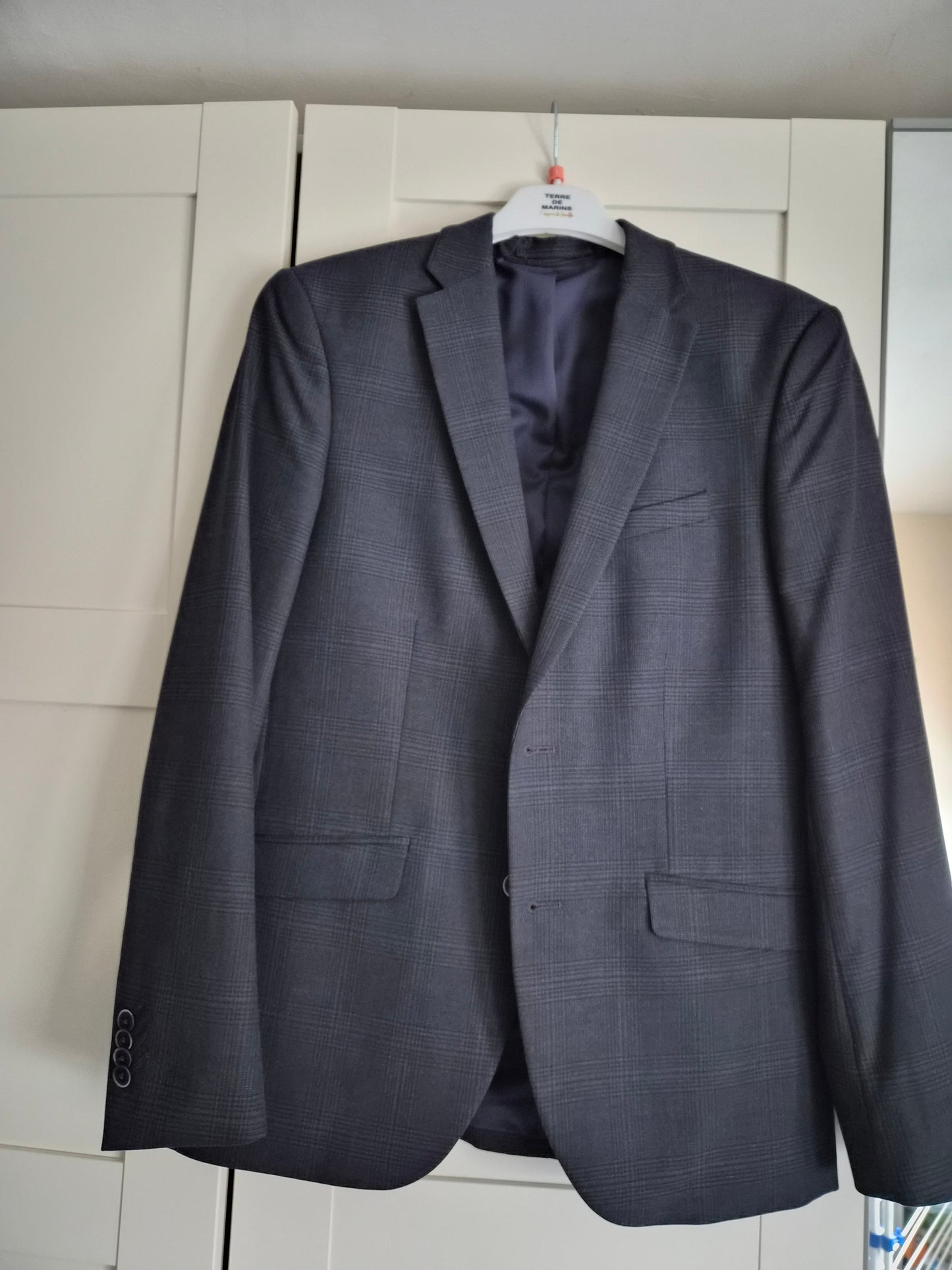 Veste de costume bleu foncé a carreaux