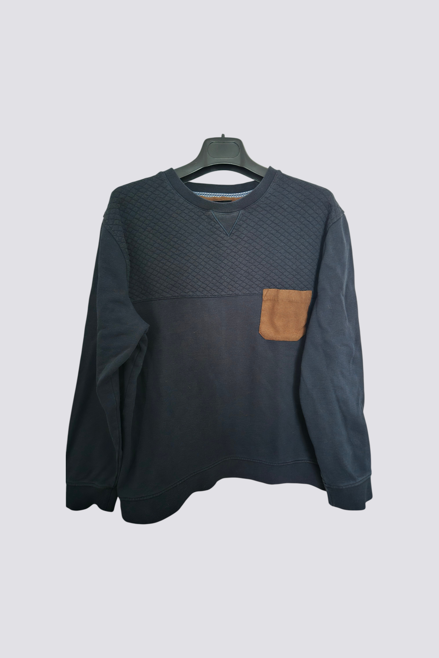 Pull bleu gauffré poche poitrine