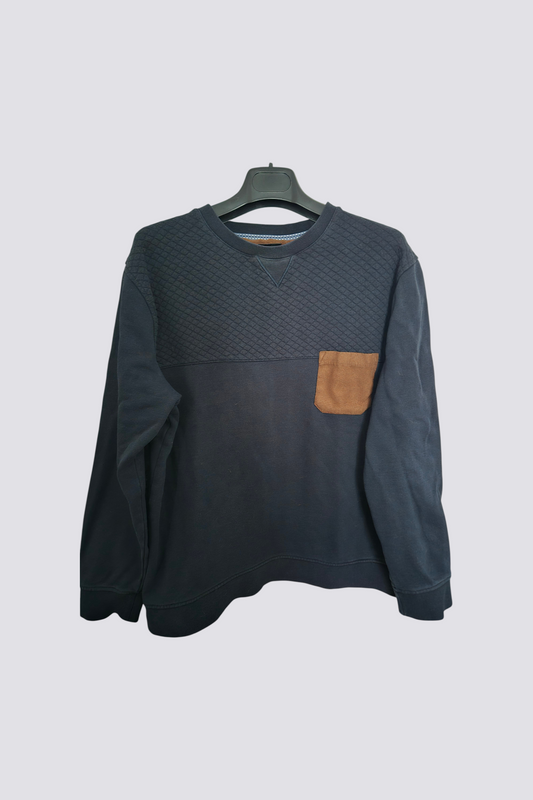 Pull bleu gauffré poche poitrine