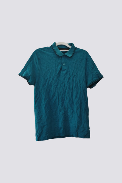 Polo bleu motif points noirs. Taille L