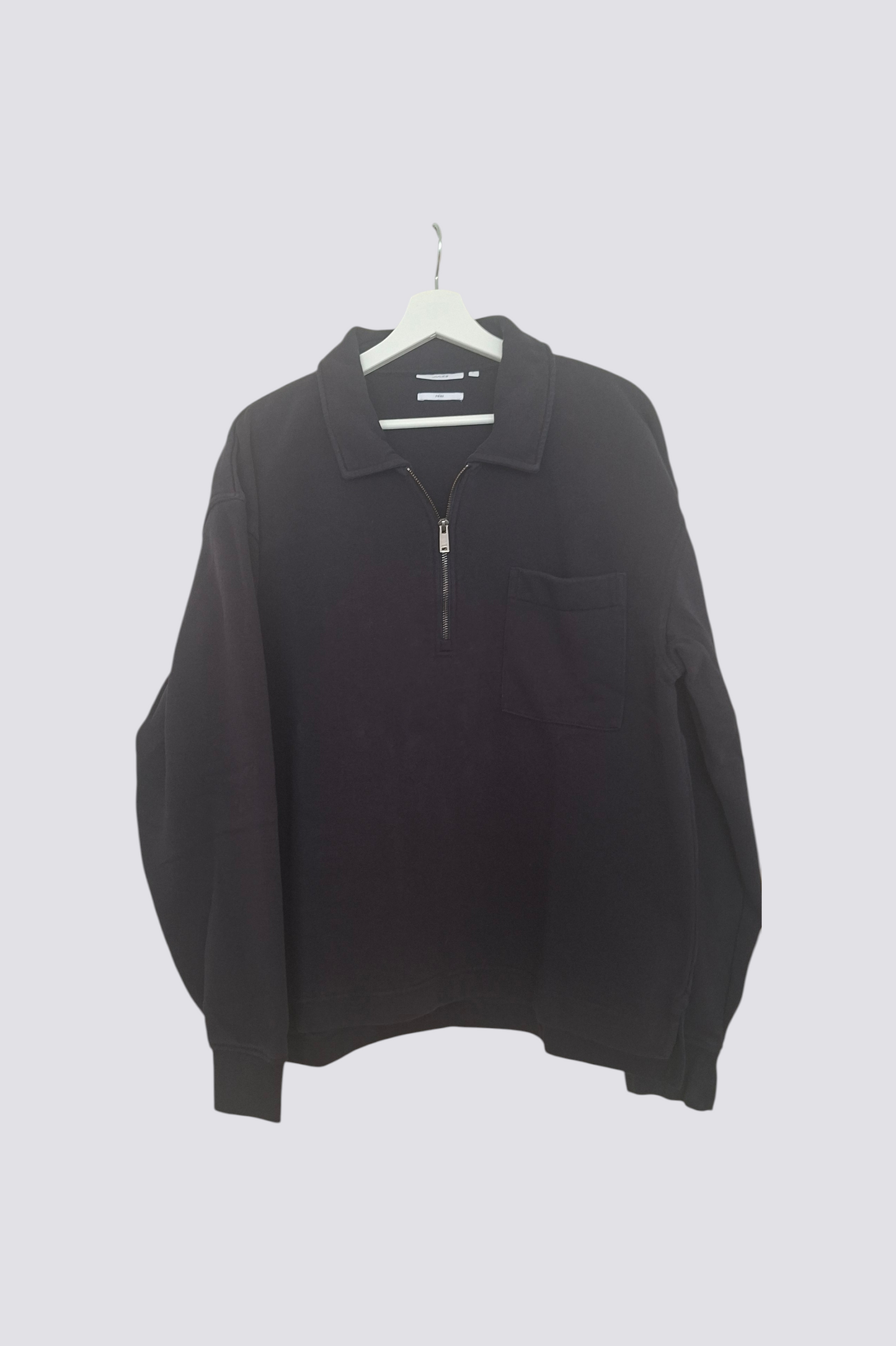 Sweat col polo zippé uni
