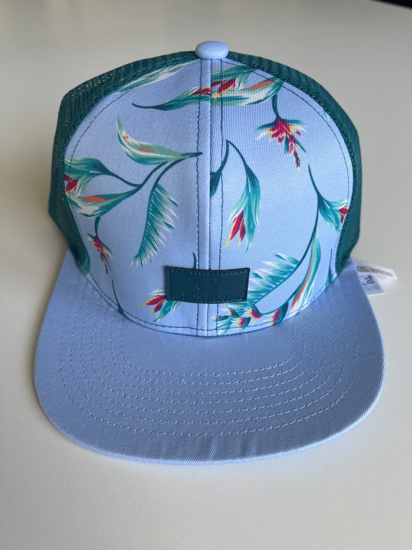 Casquette à fleurs turquoise neuve