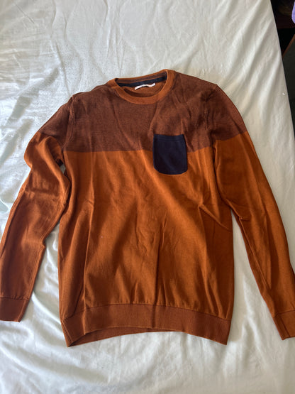 Pull colorblock avec poche poitrine