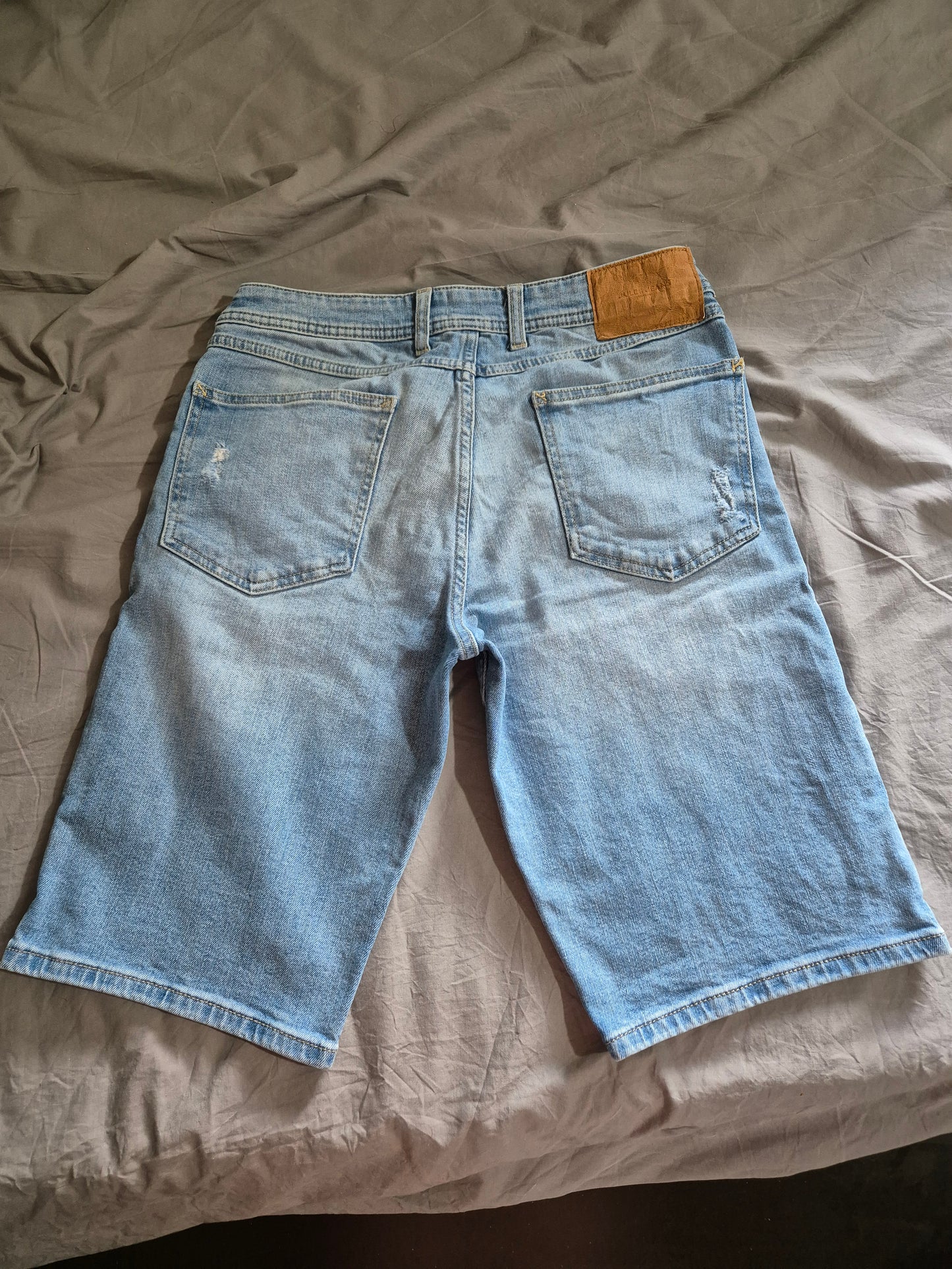 Bermuda en jean usé