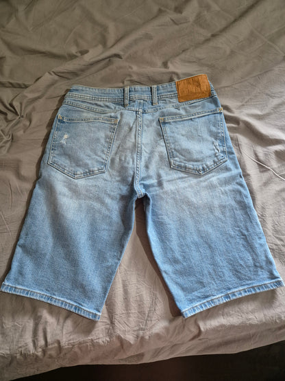 Bermuda en jean usé
