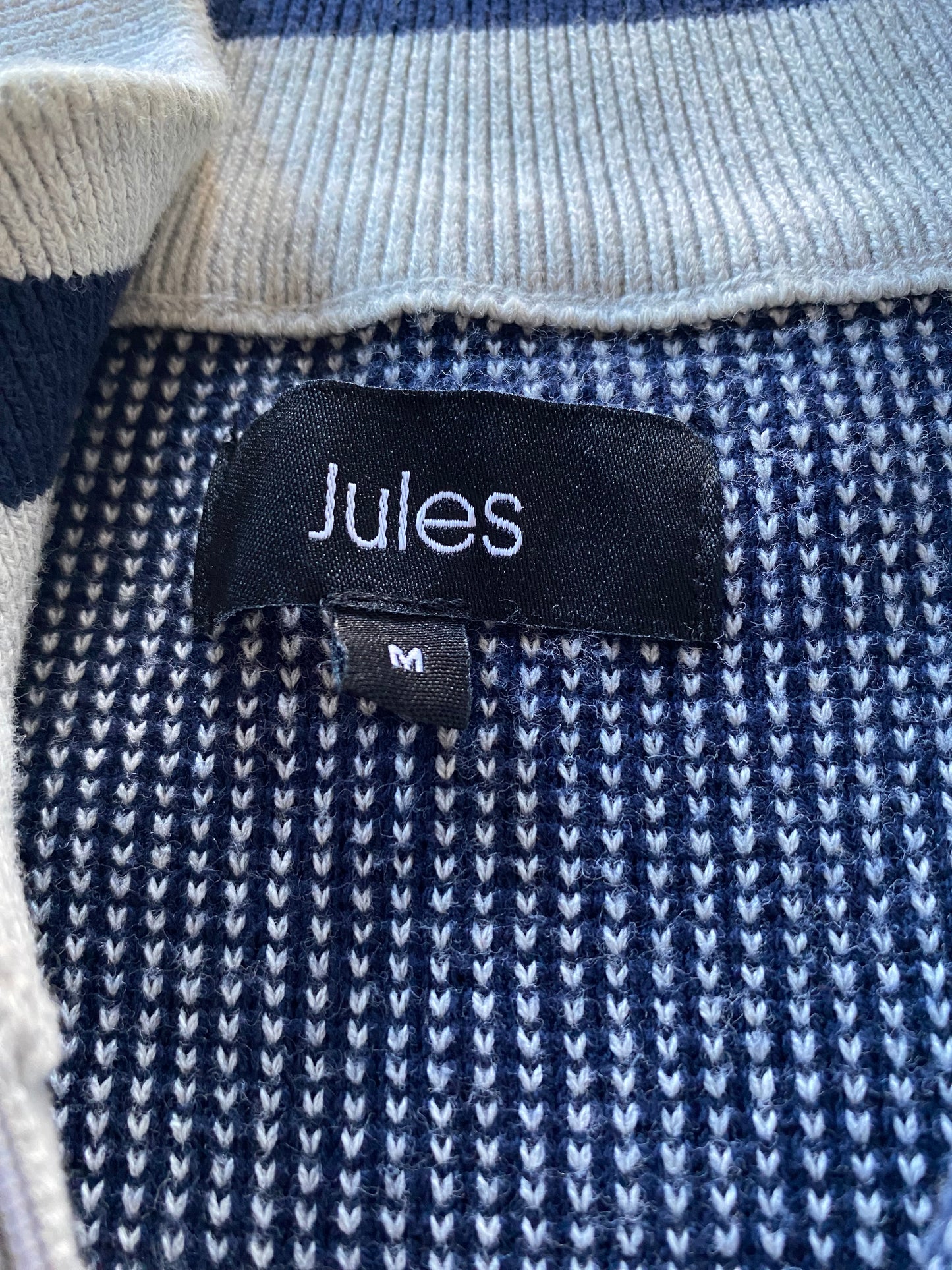 Pull col montant zippé rayé en maille fa