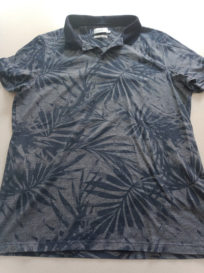 Polo imprimé feuillage à manches courtes