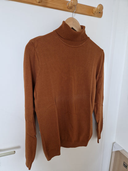Pull col roulé uni