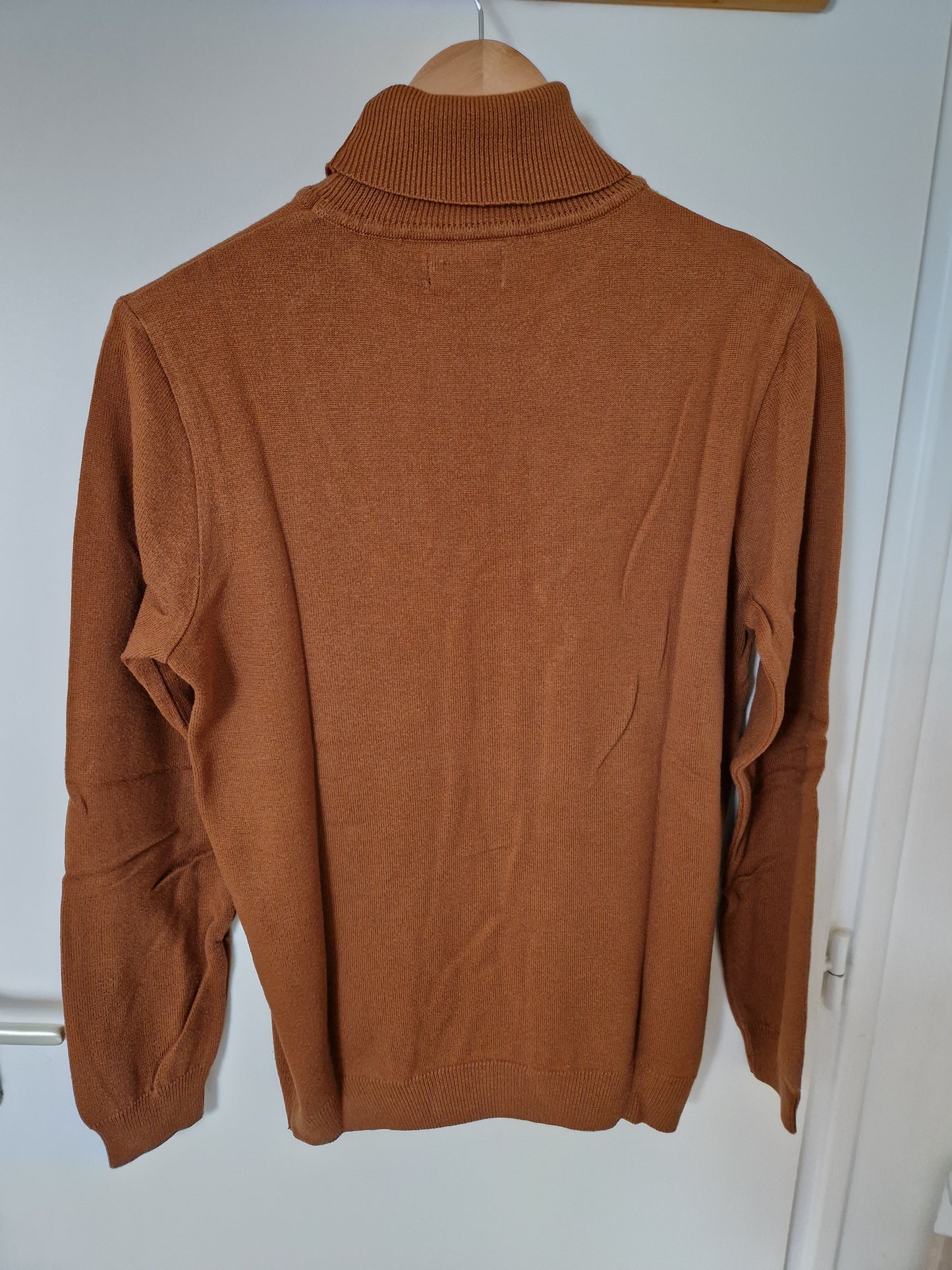Pull col roulé uni