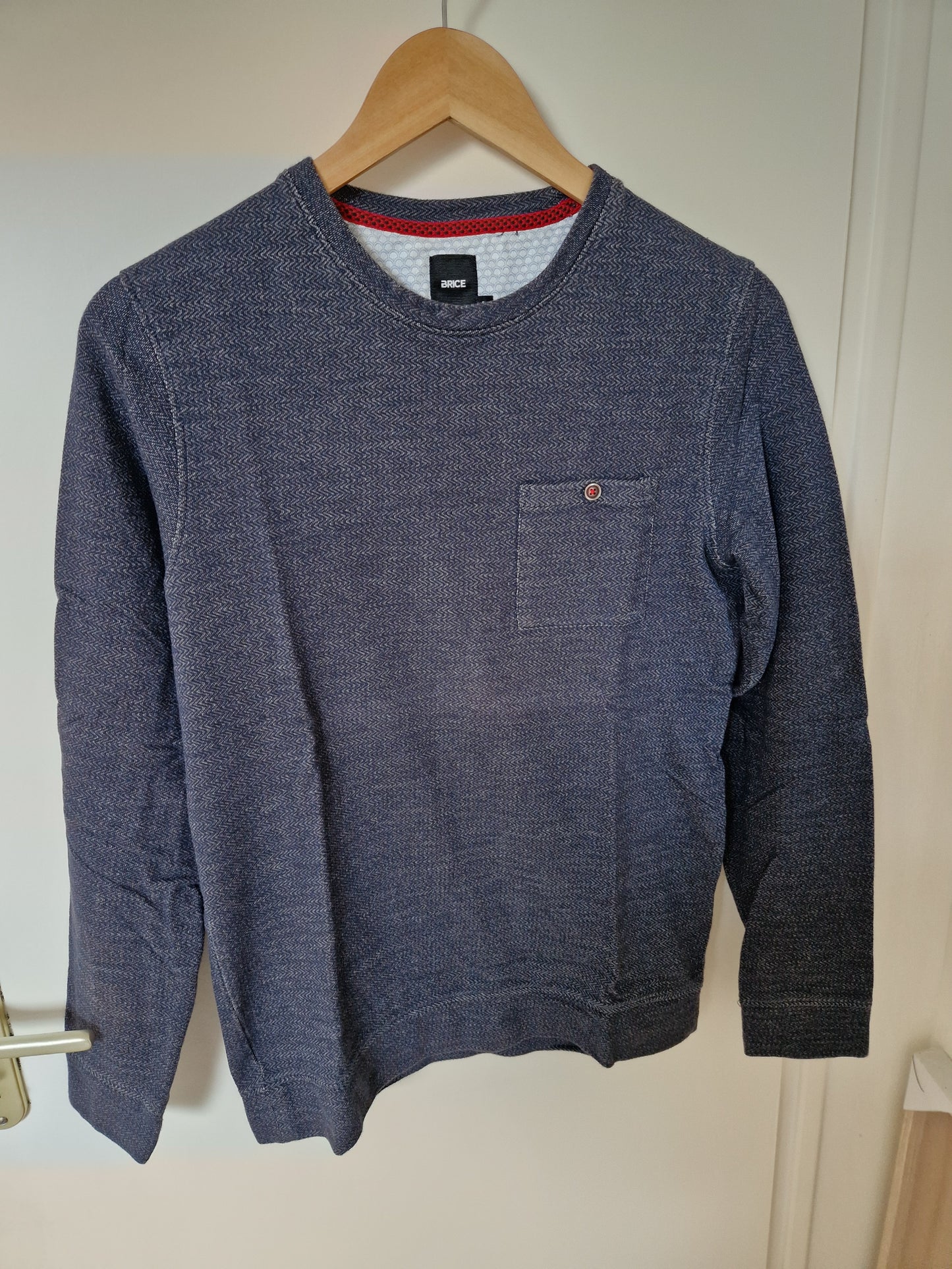 Sweat motifs à chevrons poche poitrine