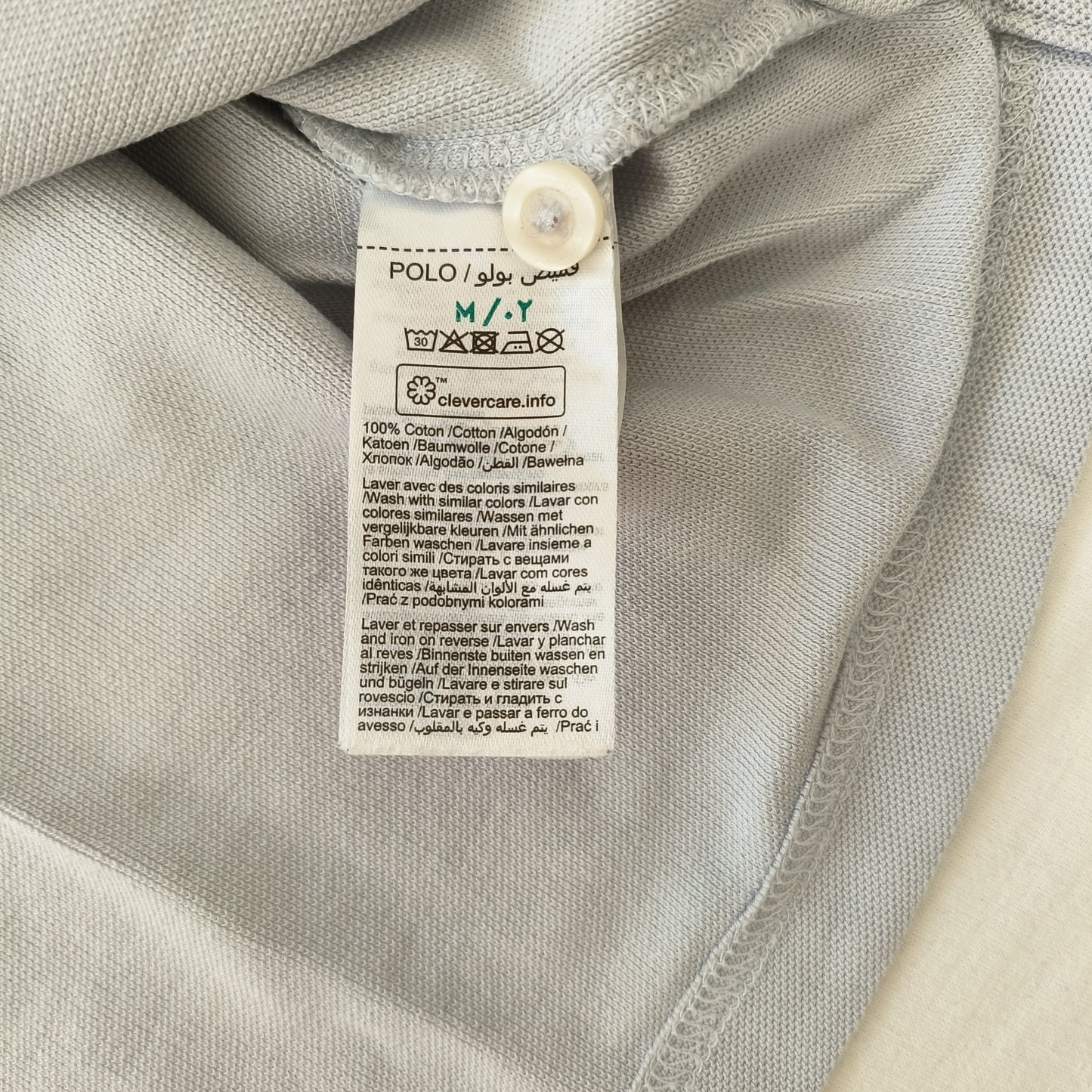 Polo manche longue gris clair coupe regular taille M