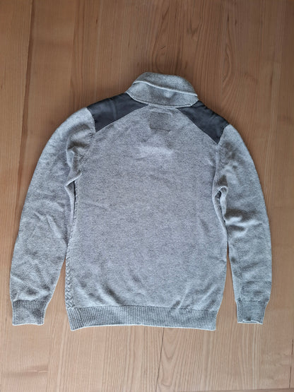 Pull gris mail tressée