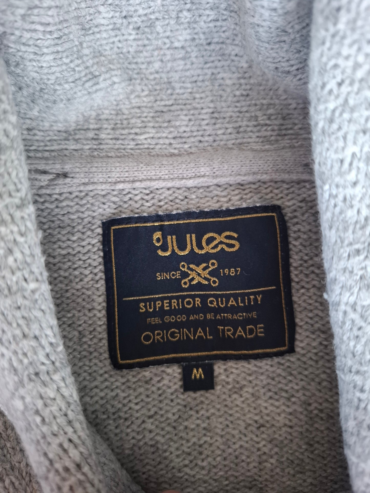 Pull gris mail tressée