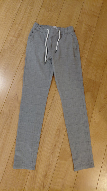 Pantalon chino slim ceinture élastiquée à carreaux
