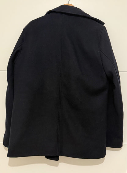 Manteau court boutonnage croisé