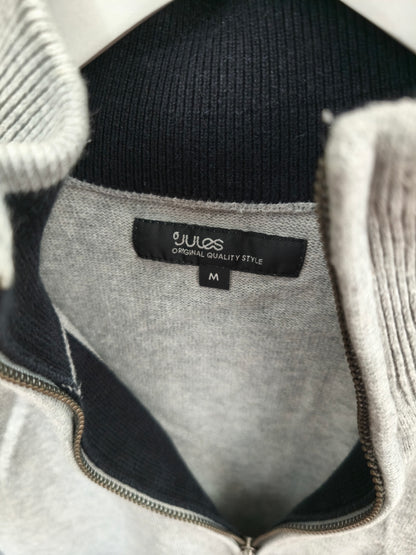 Pull zippé gris