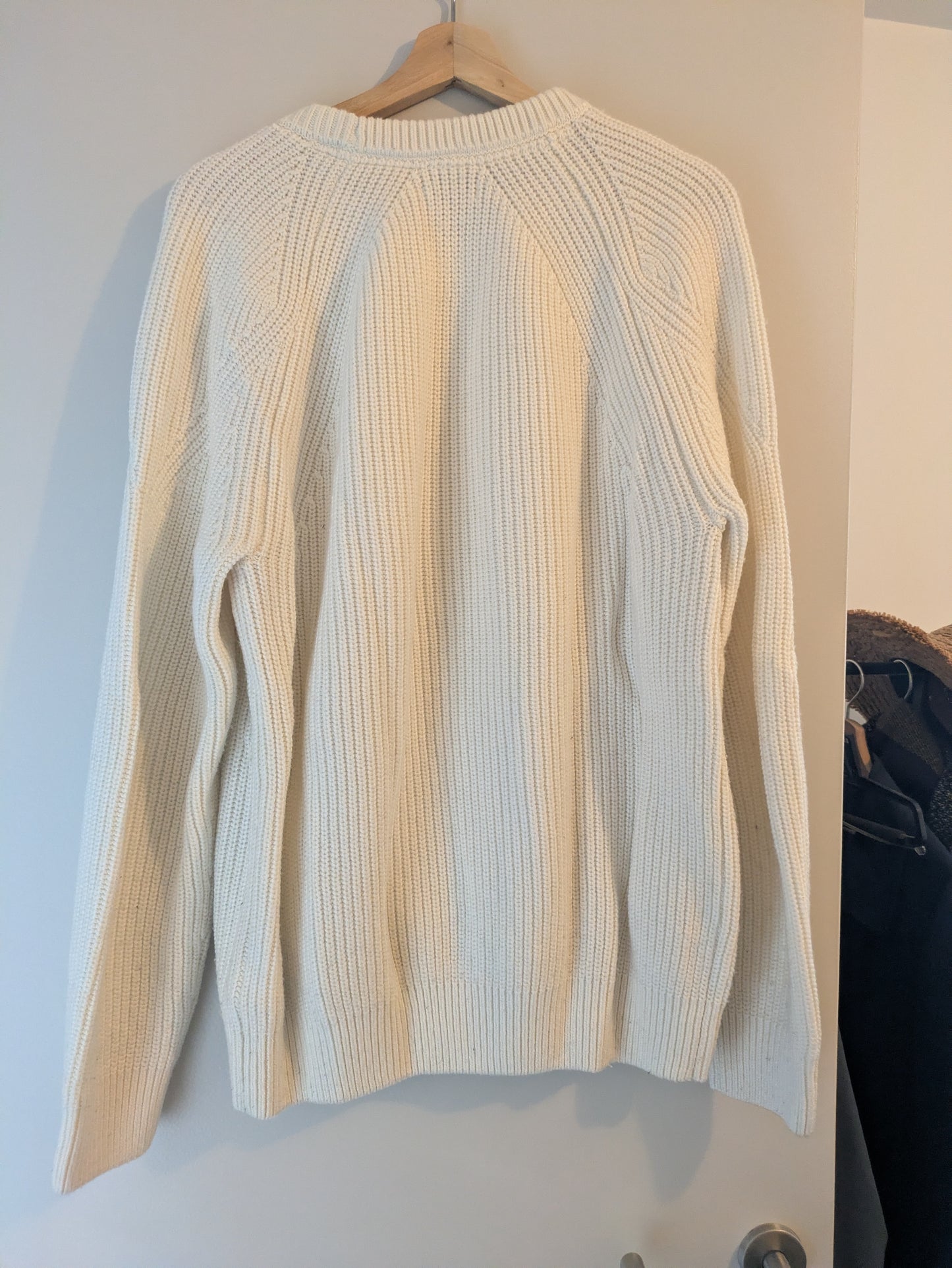 Pull col rond laineux uni