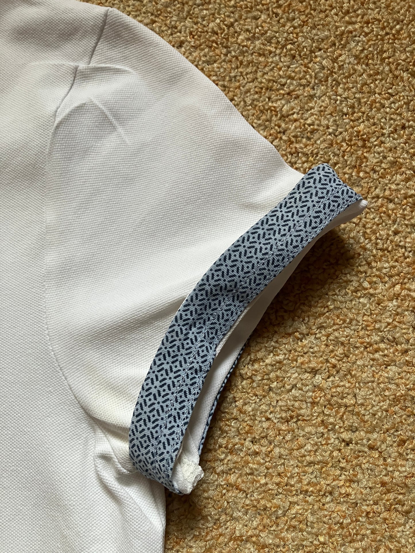 Polo manches courtes piqué en coton recyclé