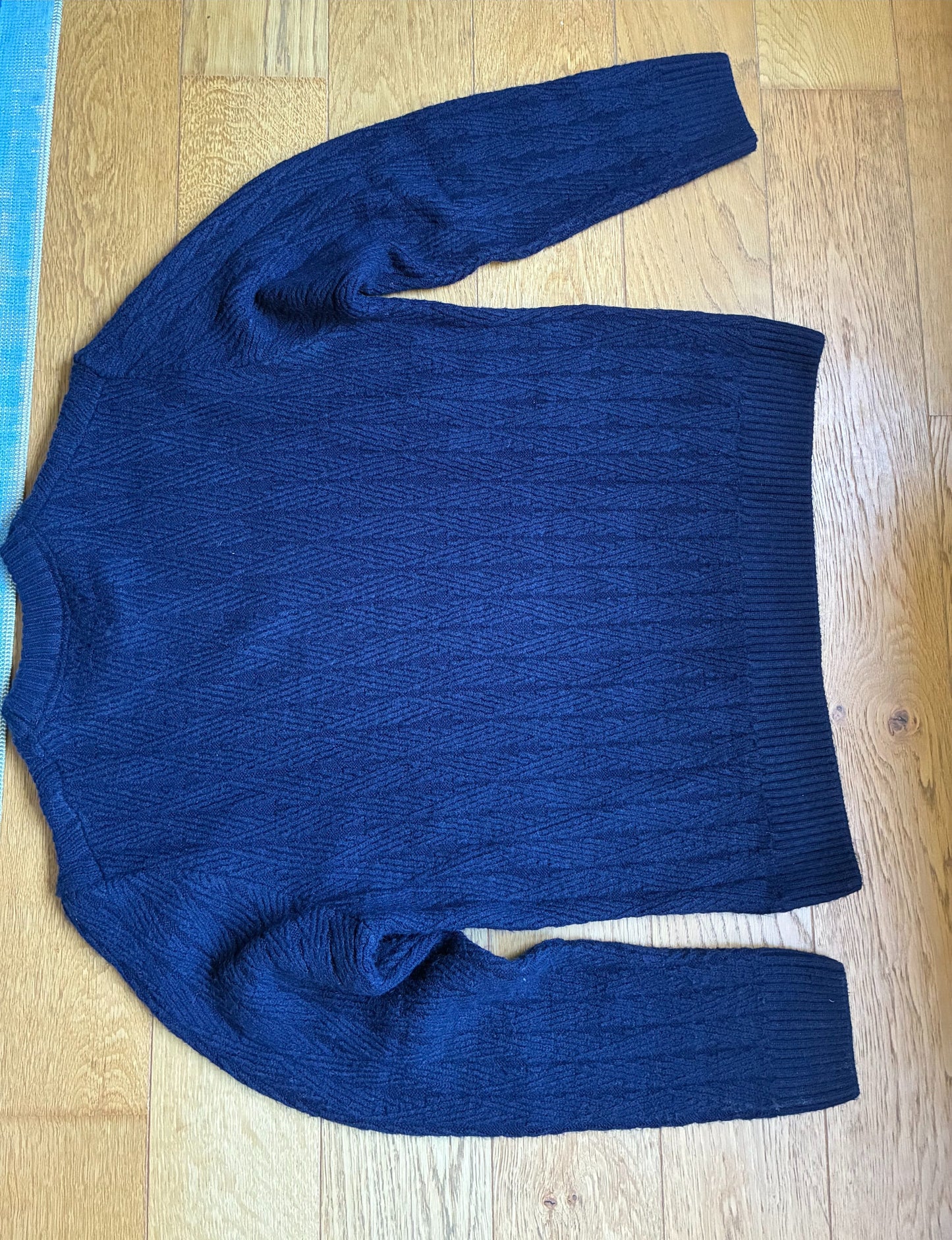 Pull tressé bleu