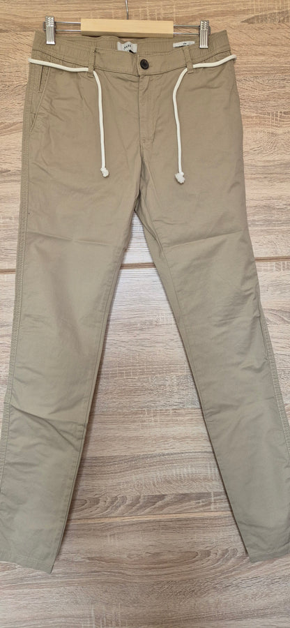 Pantalon élastiqué avec cordons