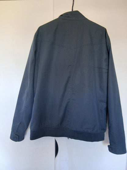Blouson col montant doublure fantaisie.