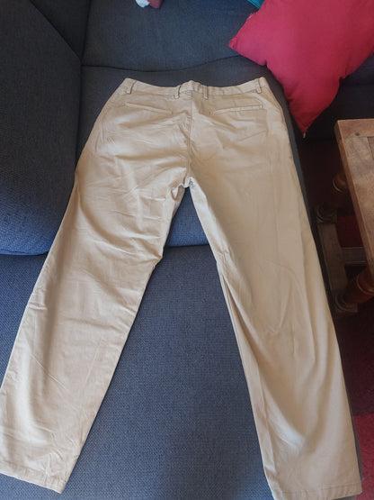 Pantalon chino à plis