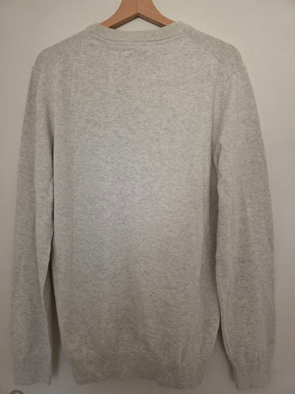 Pull col rond poche contrastée