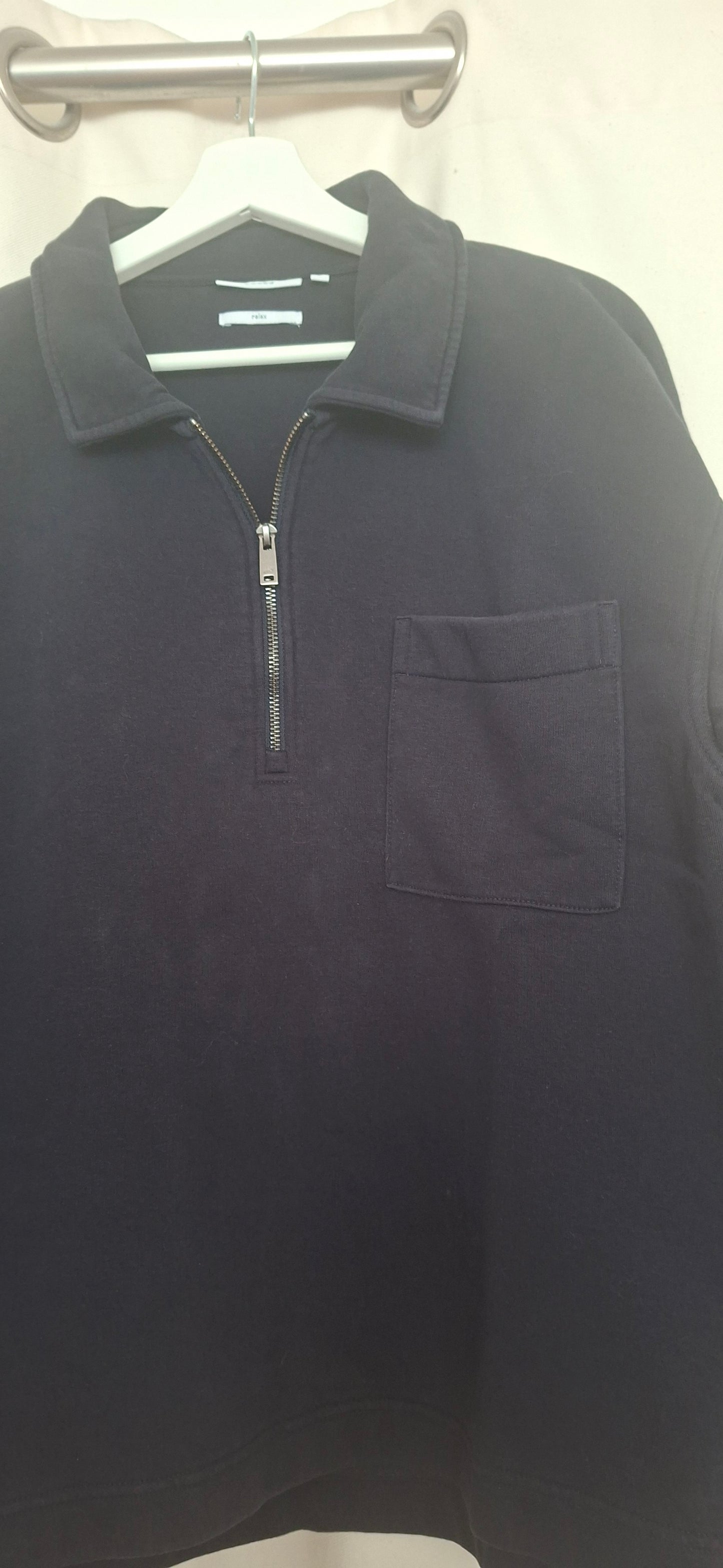 Sweat col polo zippé uni