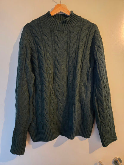 Pull col montant laineux à torsades