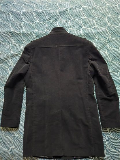 Manteau noir touché velour