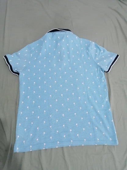 Polo manche courte imprimé palmiers