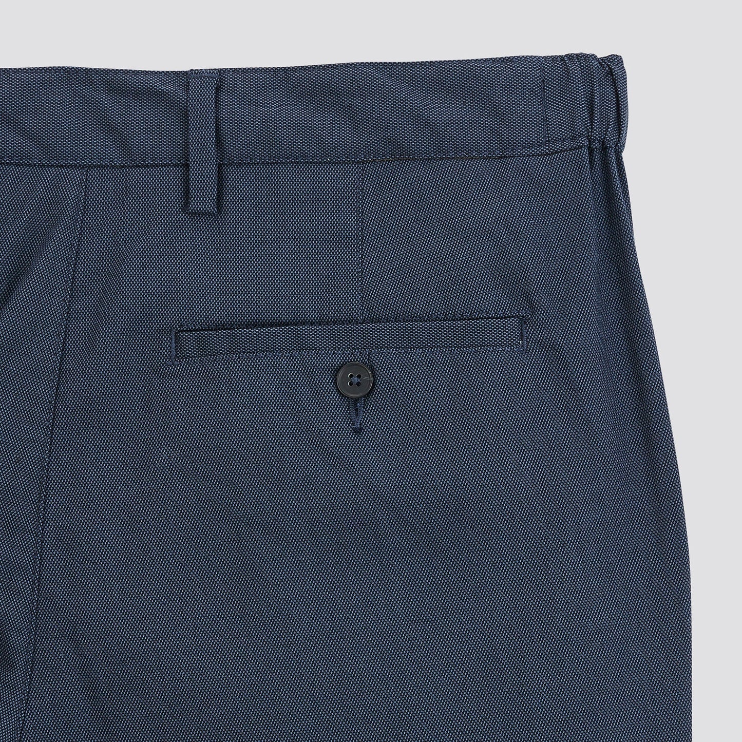 Pantalon chino slim elastiqué reliefé