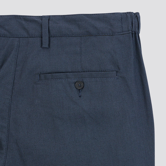 Pantalon chino slim elastiqué reliefé