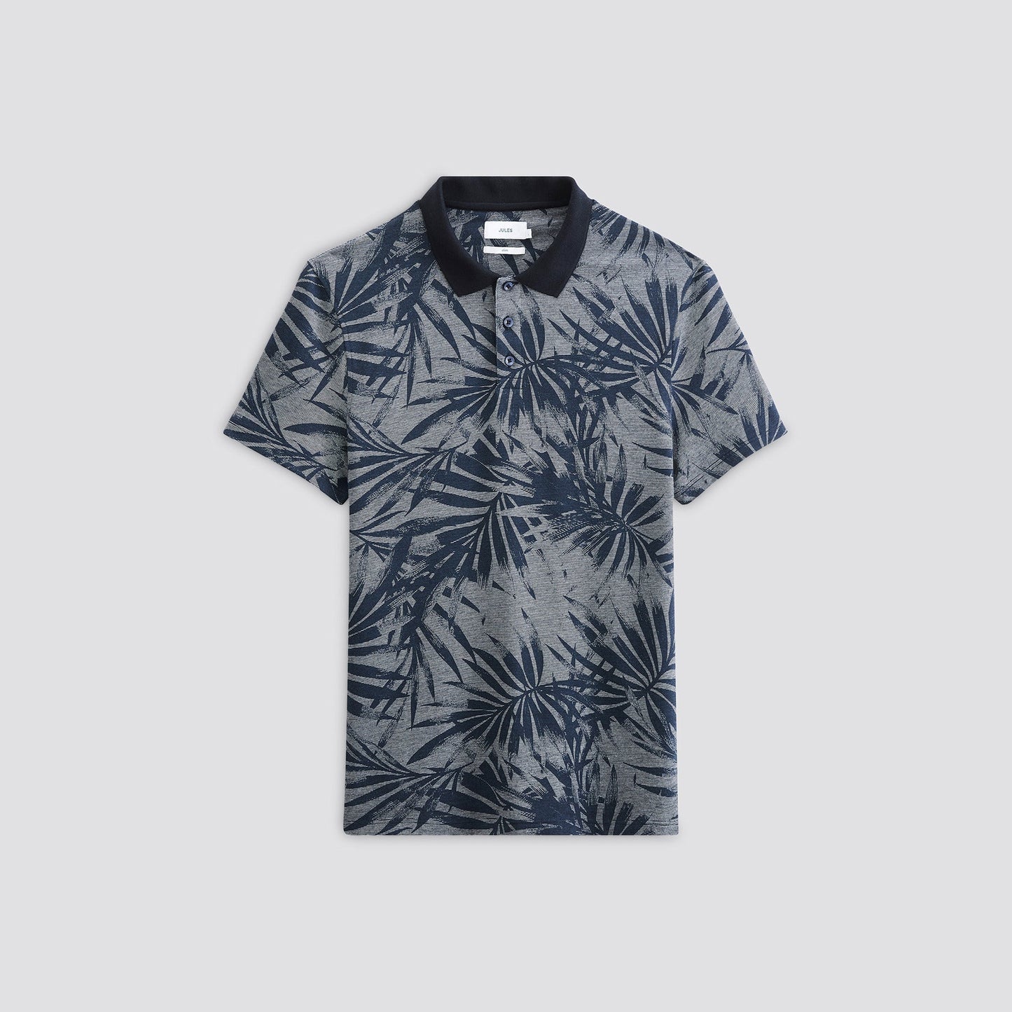 Polo imprimé feuillage à manches courtes