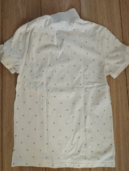 Polo blanc/écru à motifs