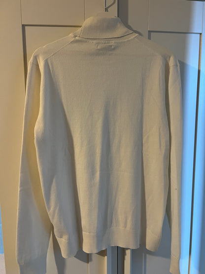 Pull col roulé essentiel