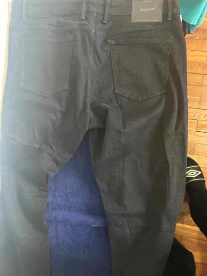 Jean noir Slim 46 /32 quasiment neuf