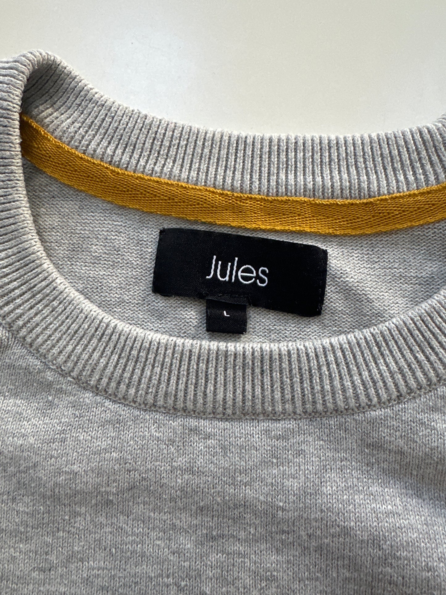 Pull col rond à message bouclette