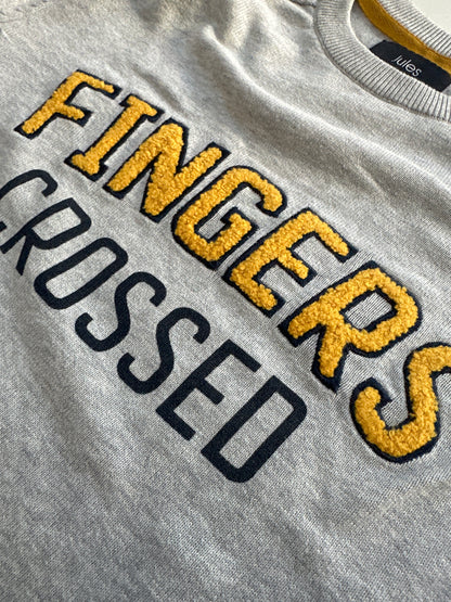 Pull col rond à message bouclette