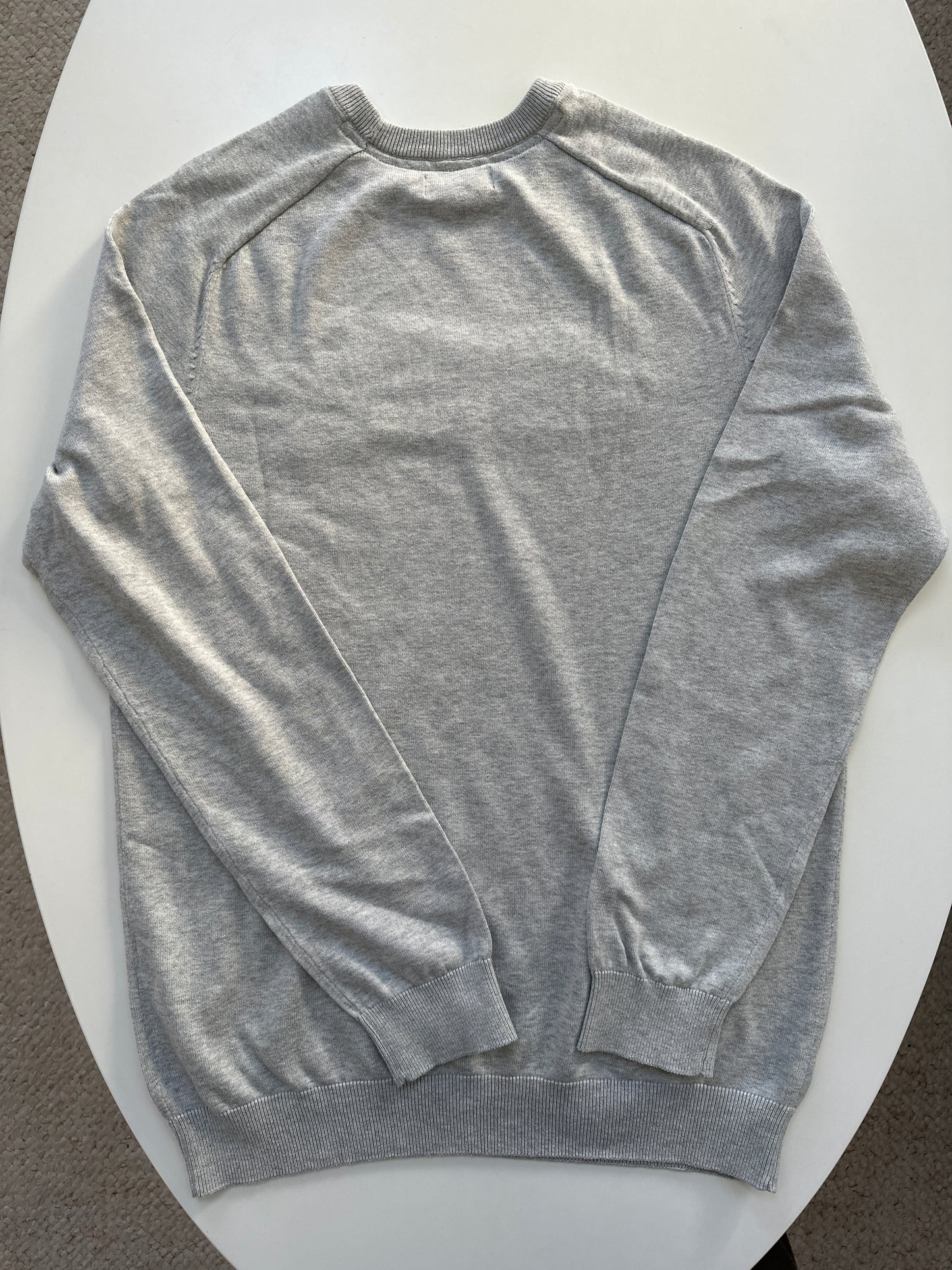 Pull col rond à message bouclette