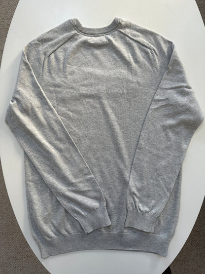 Pull col rond à message bouclette